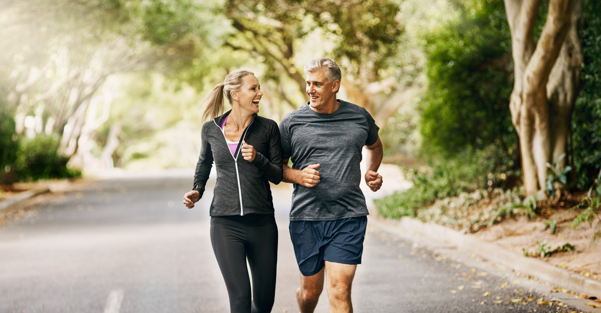 Active couple enjoying a low-impact outdoor walk together